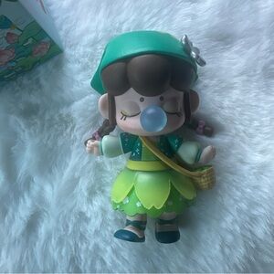 Green and Brown Kids Toy Figure